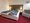 Villa Vier Inselblick | Rügen - Schlafzimmer 1 - Doppelbett - Sessel